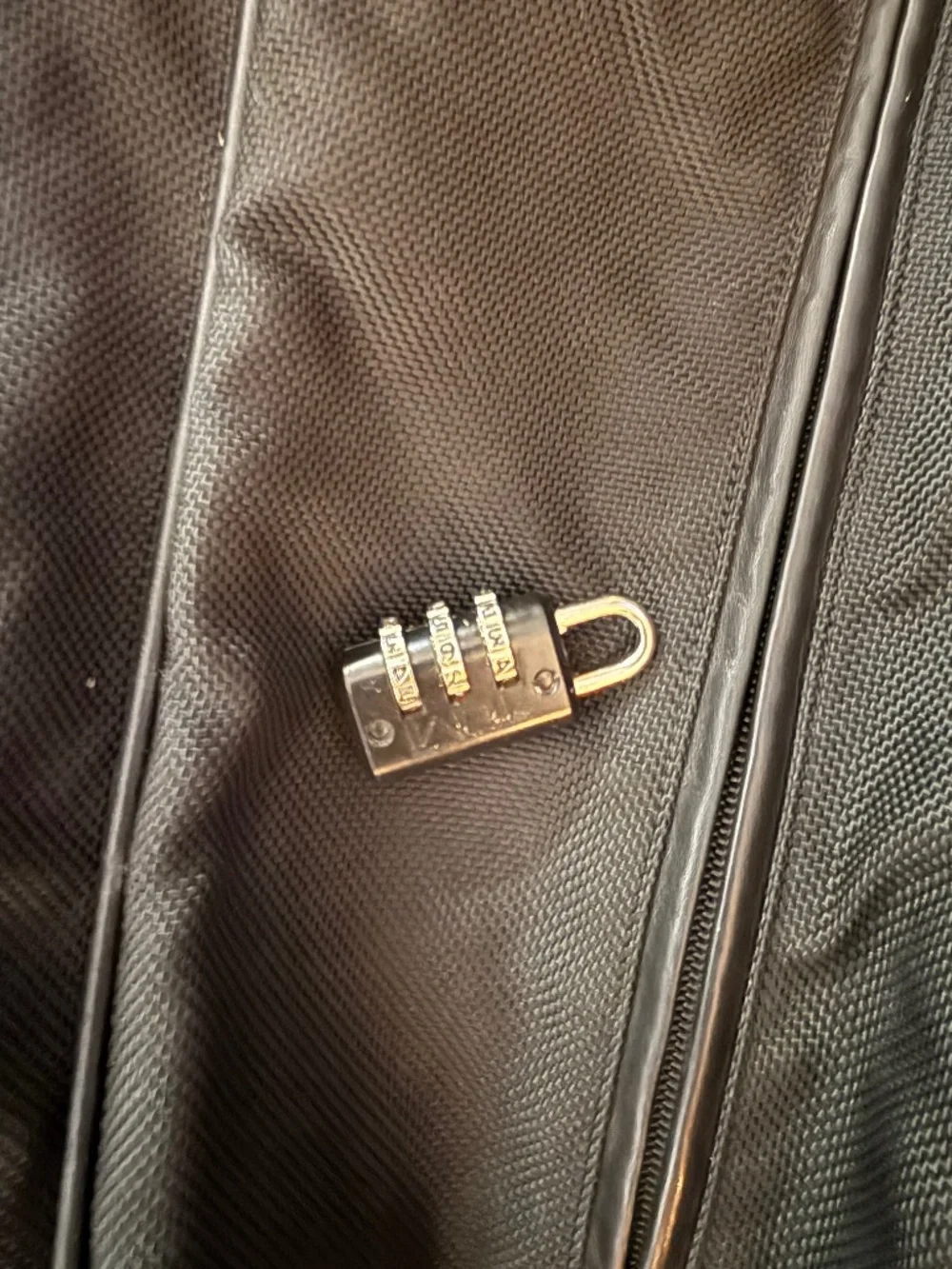 TUMI  Black Carry/Weekend Back with Leather Trim